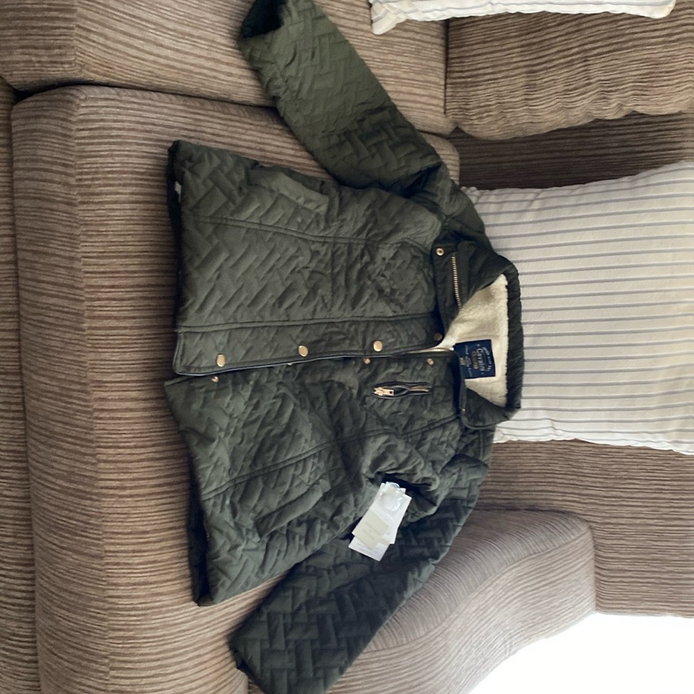 More of an olive green petite X L ladies jacket.
